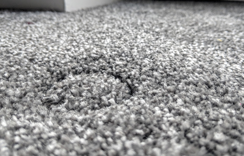 how to get furniture dents out of carpets
